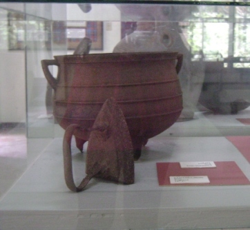 Iron and three-legged pot